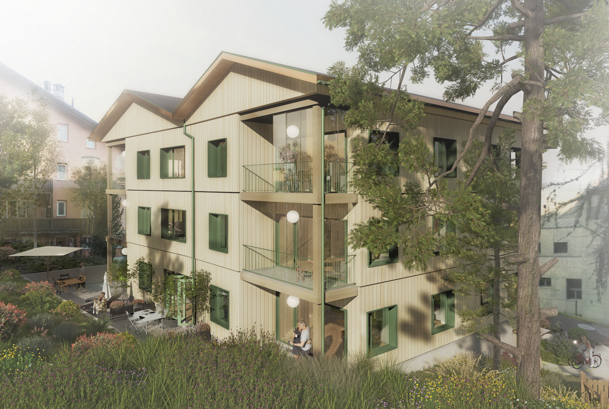 Pilotprojekt 2401 Pontresina, Rückansicht des Holzbau Mehrfamilienhauses, eingebettet in den alpinen Wald des Oberengadins