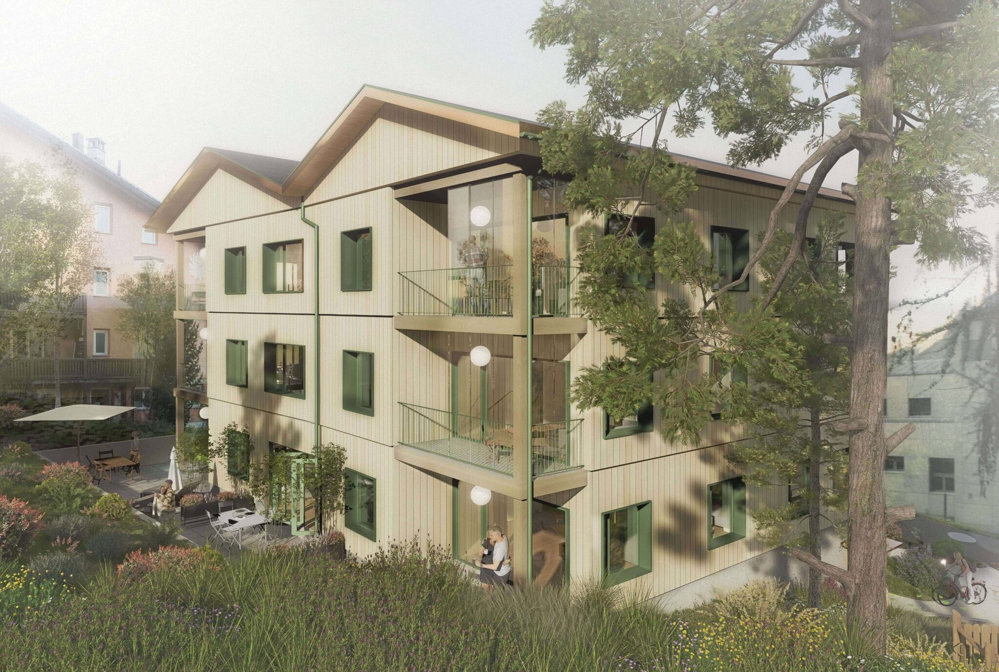 Pilotprojekt 2401 Pontresina, Rückansicht des Holzbau Mehrfamilienhauses, eingebettet in den alpinen Wald des Oberengadins