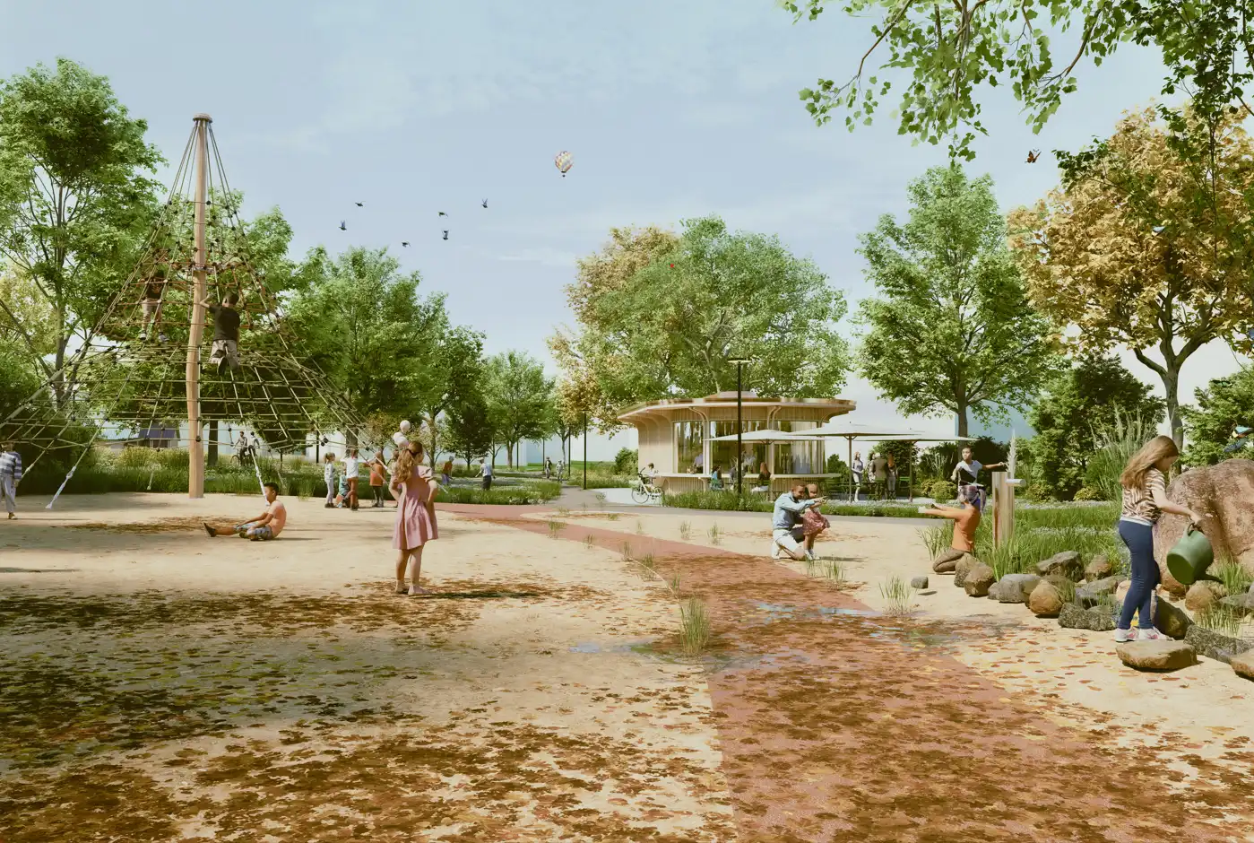 Spielplatz im Grabenhof-Park Kriens mit Kletterstruktur aus Holz, naturnahem Wasserspielbereich, bepflanzten Freiräumen und Pavillon in parkartiger Umgebung